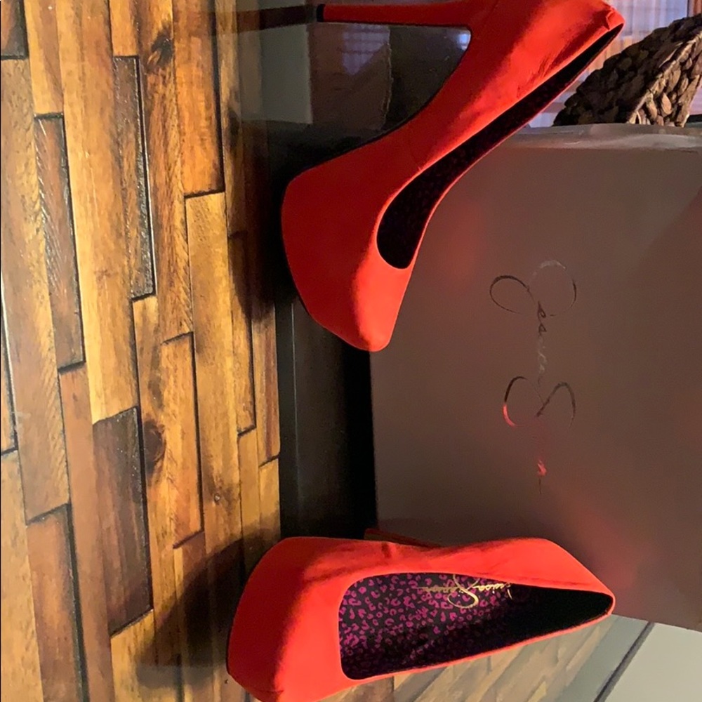 High heel shoe. NEVER WORN!!